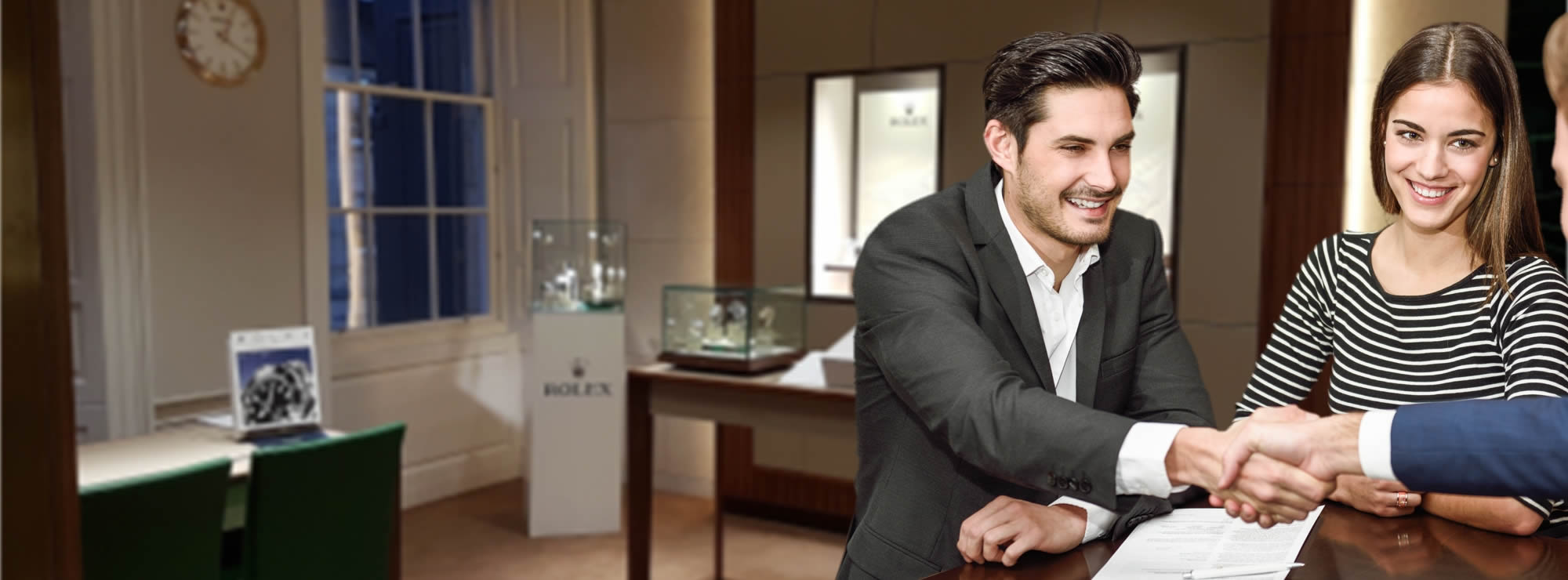 A FMG Associate Gemmologist with a gemological microscope